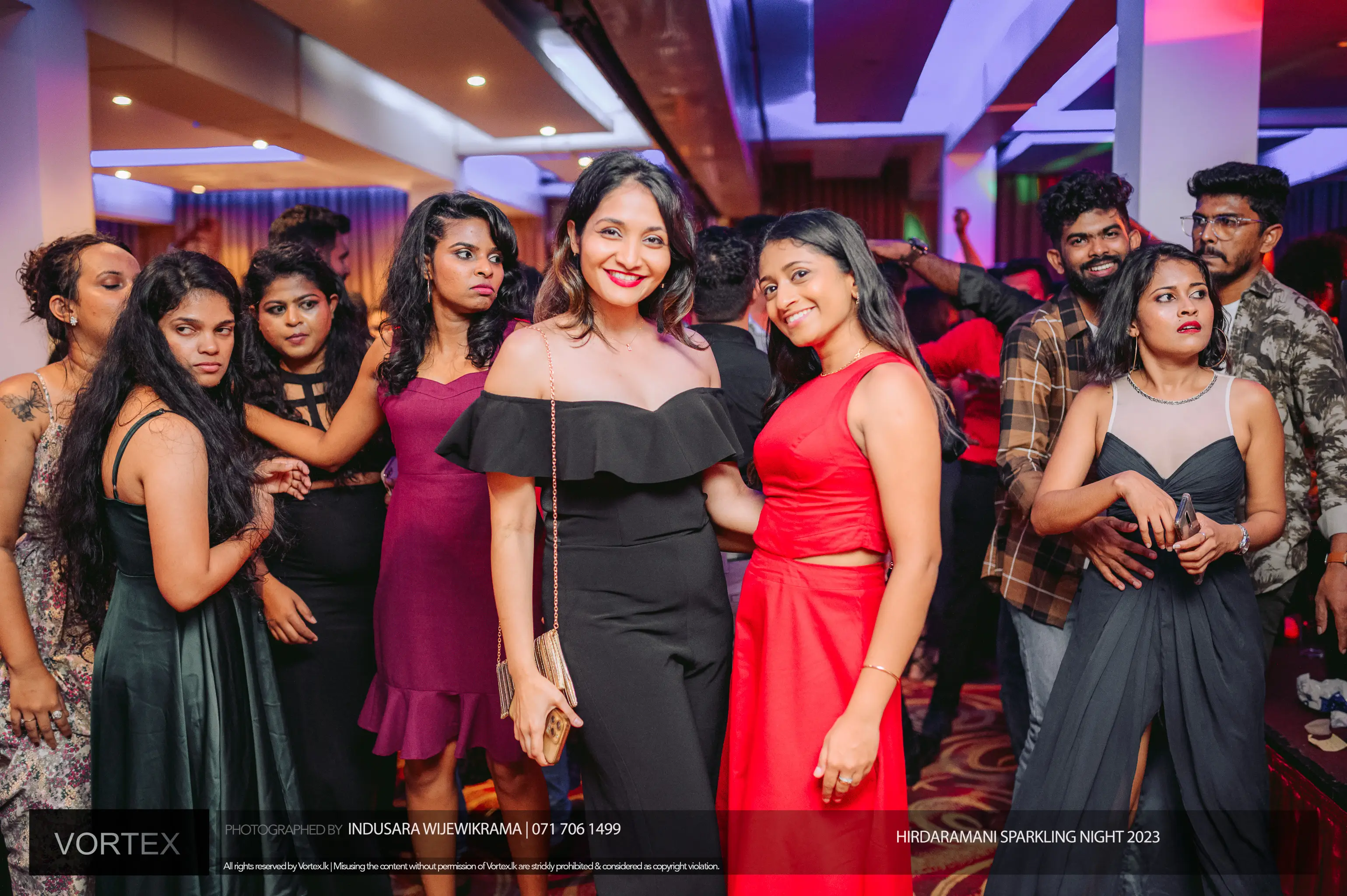 Few female employees in a party group photo