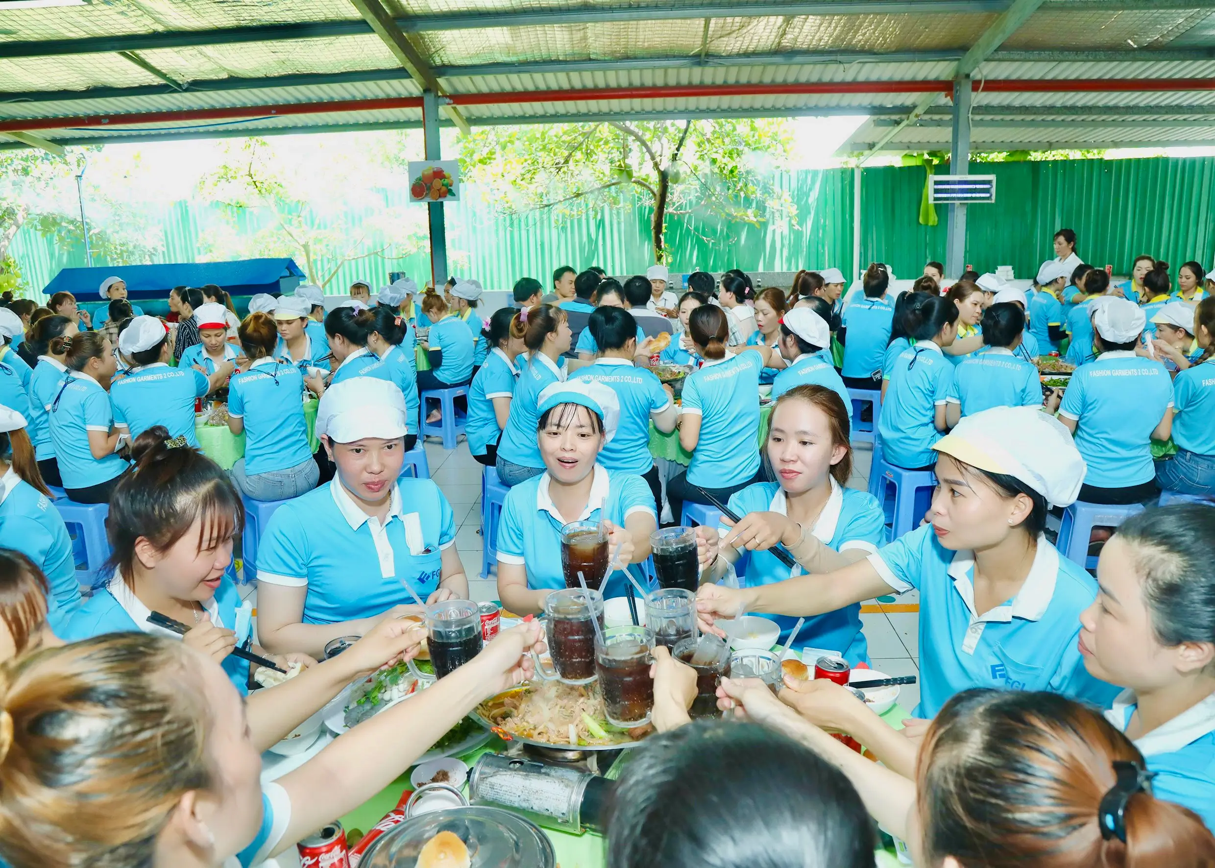 Employees of one apparel factory having a feast celebrating 30 years of anniversary at Hirdaramani