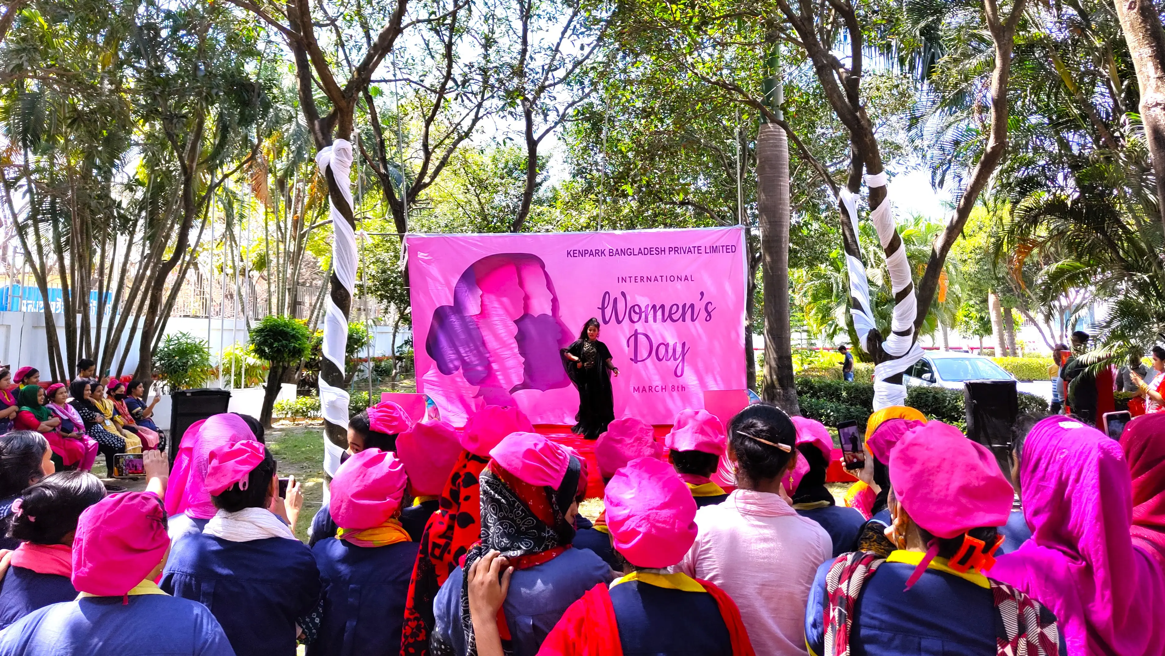 A female employee dancing in an out door stage at Bangladesh apparel plant of hirdaramani in an event organized for international womens day