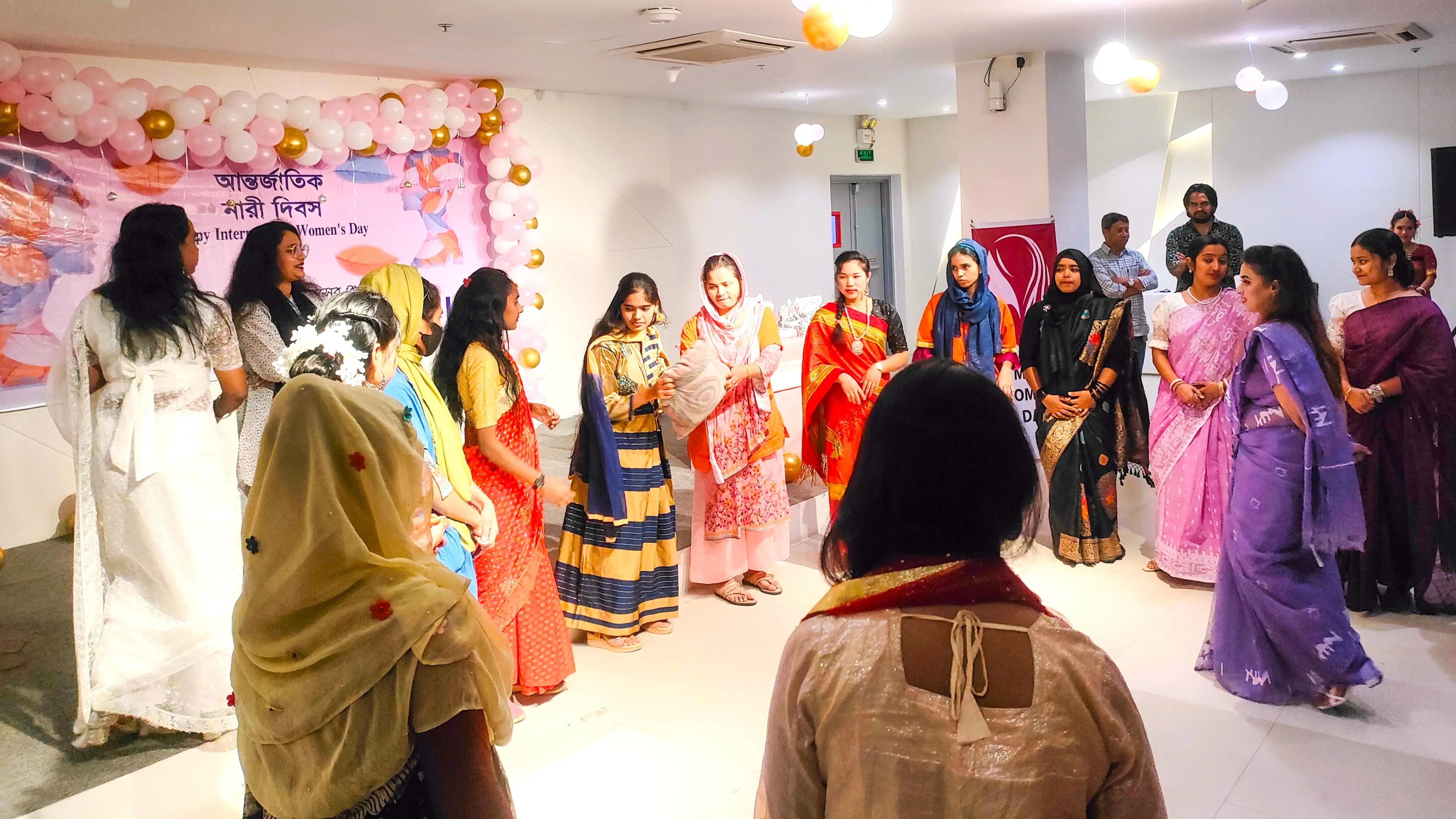 Female employees participating in a game